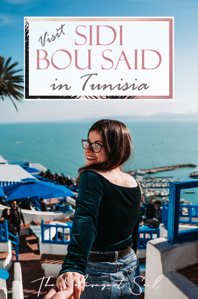 Why visit Sidi Bou Said in Tunisia. A beautiful town of blue gates and white buildings. With pink flowers and overseeing the Mediterranean, this is a beautiful small town with fantastic beaches and next to Cartague and Tunis | The Solivagant Soul Travel Blog