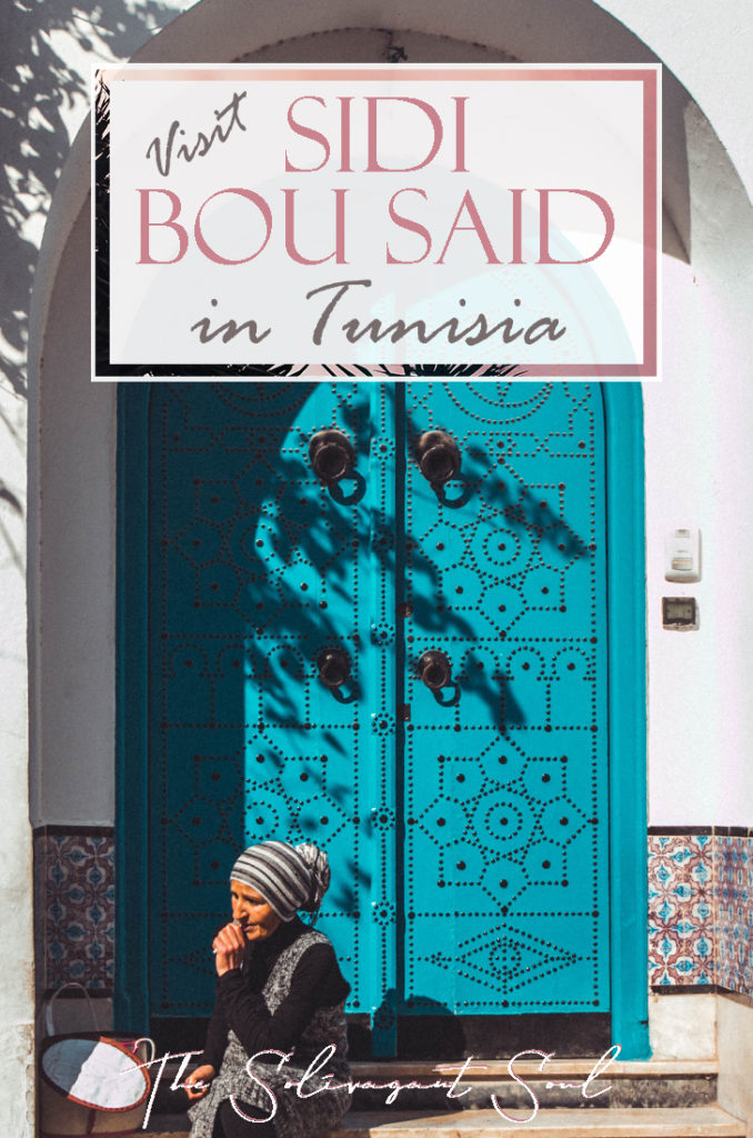 Why visit Sidi Bou Said in Tunisia. A beautiful town of blue gates and white buildings. With pink flowers and overseeing the Mediterranean, this is a beautiful small town with fantastic beaches and next to Cartague and Tunis | The Solivagant Soul Travel Blog